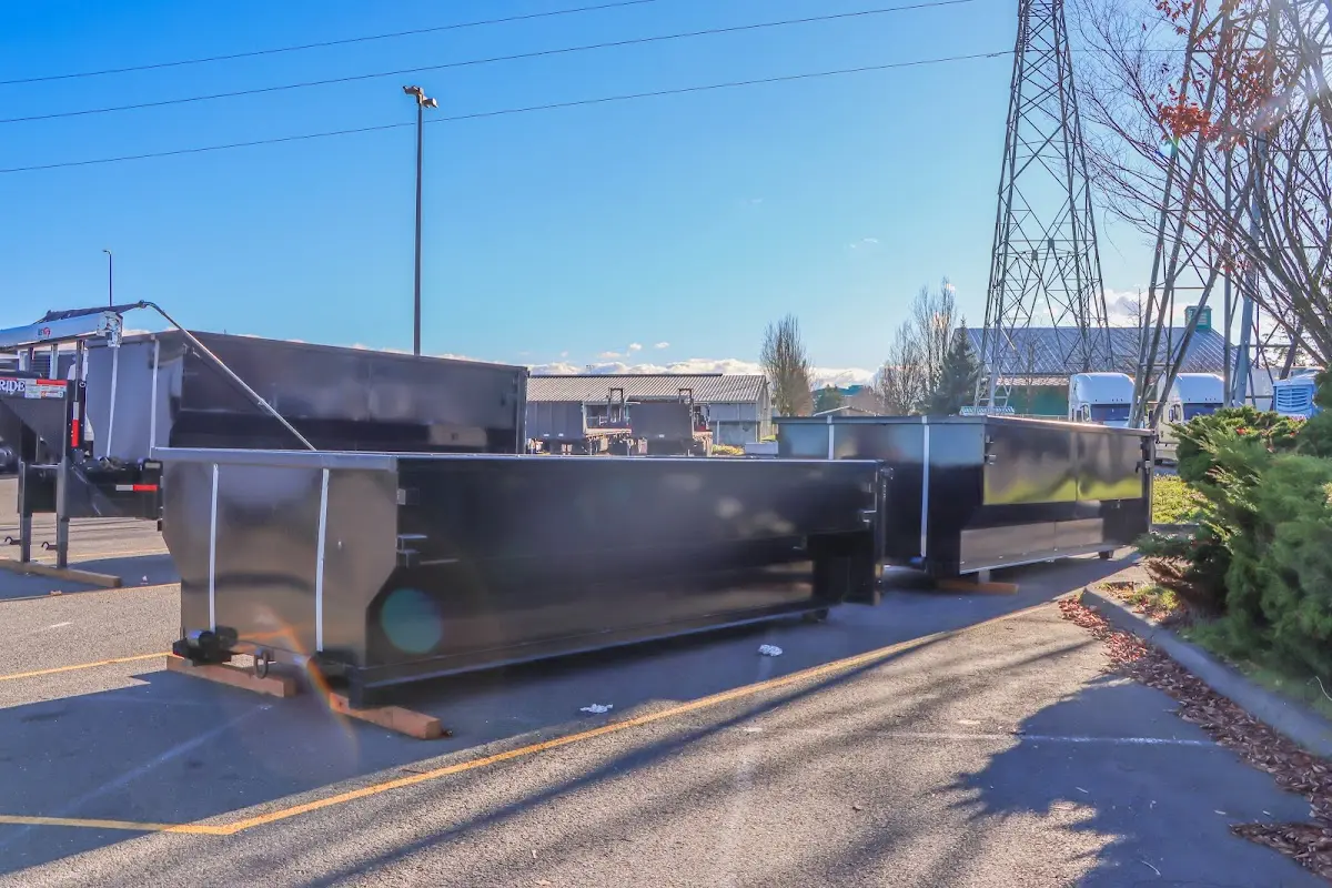 Roll-off dumpster ready for waste disposal at job site for Yard Waste Dumpster Rental in Gonzales